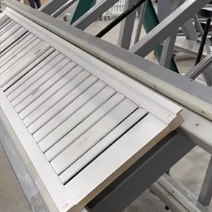 A shutter panel laid on the factory workbench